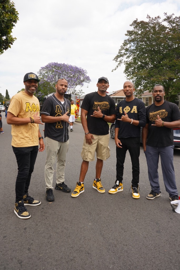 Alpha Phi Alpha fraternity members at a DSE community event