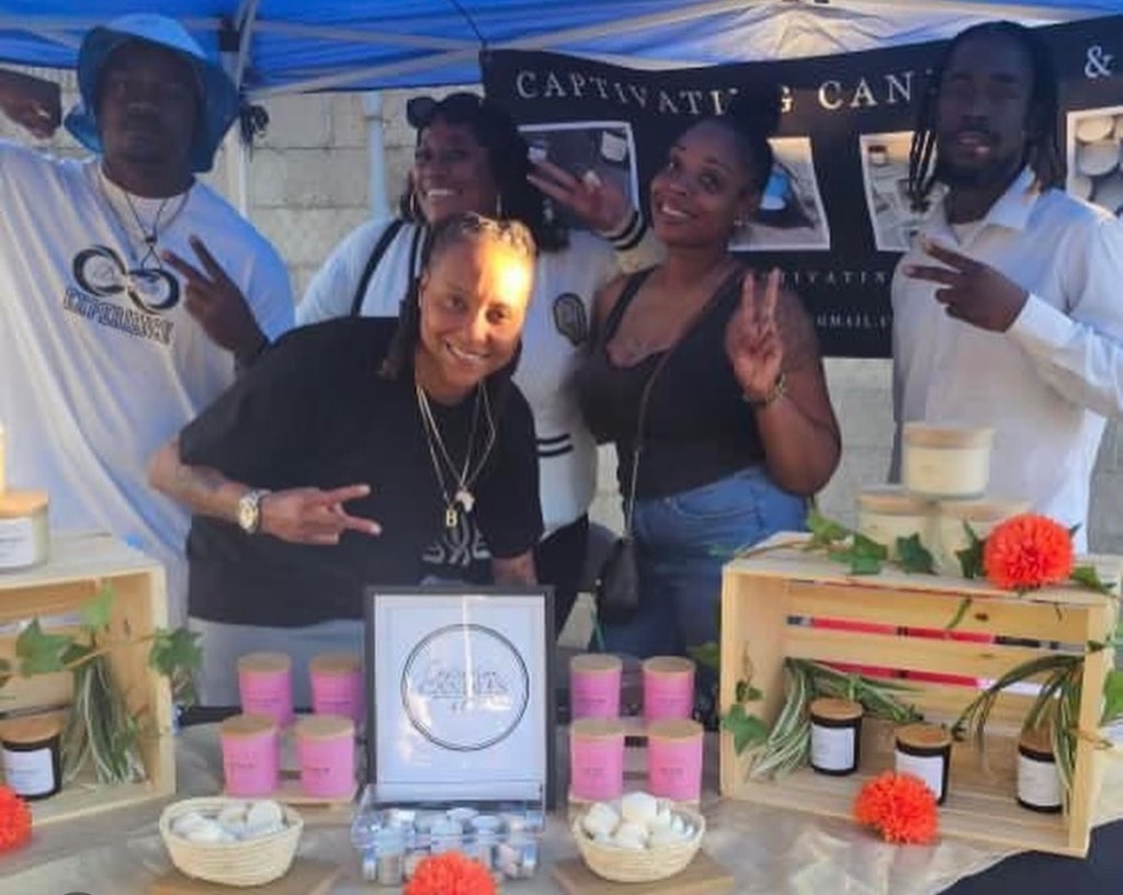 DSE team and community partners at the Captivating Candles vendor booth